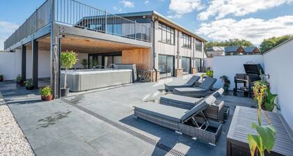 A premier conversion offers a masterclass in high-end coastal living.