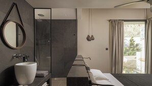 A modern bathroom with a large mirror, a round sink, and a shower. - Bianco Boutique Villas - Eve (33F2+9P2 Pefki, Greece)