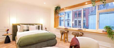 1 slaapkamer, een strijkplank/strijkijzer, wifi, beddengoed