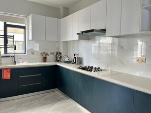 Private kitchen - Elegant 5-Bedroom  with Exquisite Design and Unmatched Comfort (Nairobi)