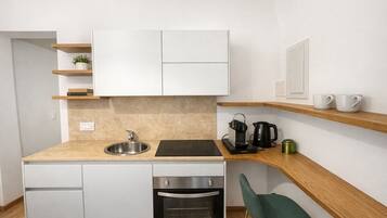 Apartment (0 Bedroom) | Dapur peribadi | Ketuhar, dapur, mesin basuh pinggan mangkuk, pembancuh kopi espreso