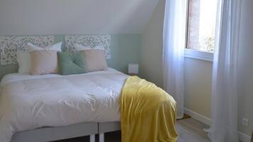 Premium bedding, memory-foam beds, iron/ironing board, free WiFi