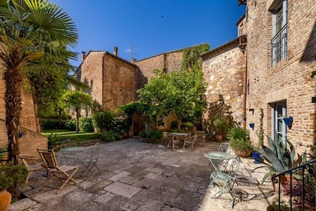 Outdoor dining. Rinaldi Guest Room with indoor pool