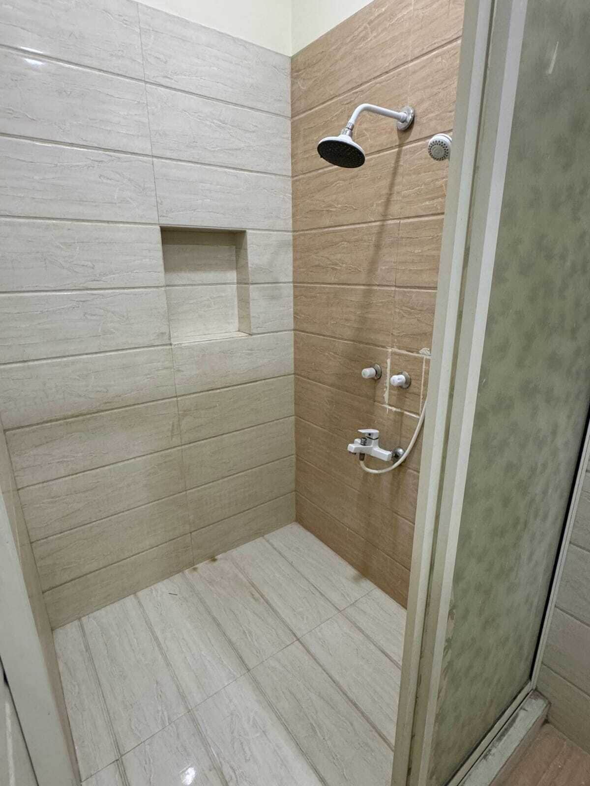 Shower, towels, soap, toilet paper