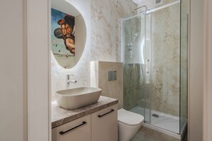 Hair dryer, towels, soap, toilet paper