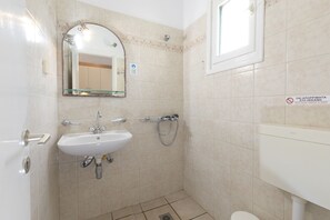 Basic Studio, Balcony, Sea View | Bathroom | Shower, hair dryer, towels, toilet paper