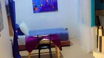 Chambre Quadruple, vue jardin | Intérieur