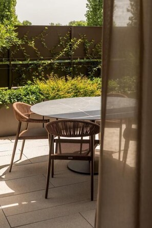 Premium Apartment, 2 Bedrooms, Garden View | Outdoor dining - Stemor srl (Desenzano del Garda)