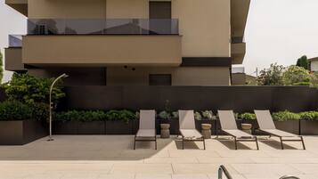 Seasonal outdoor pool, sun loungers