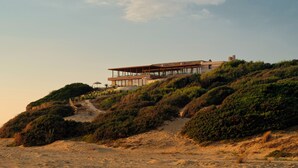 A modern house on a hill with a clear sky. -  Icona's Costa Ragusa Resort - New Opening (Scoglitti)
