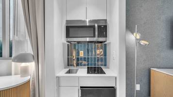 Fridge, microwave, stovetop, coffee/tea maker