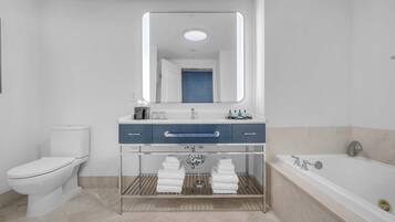 Jetted tub, hair dryer, towels, soap