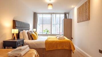 2 bedrooms, desk, iron/ironing board, travel cot
