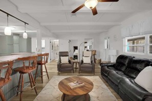 TV, fireplace - Lakefront Cabin with Private Dock (Eclectic)