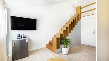 Deluxe Duplex | Living area | Smart TV