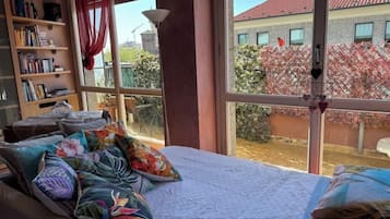 Iron/ironing board, travel crib, free WiFi, bed sheets