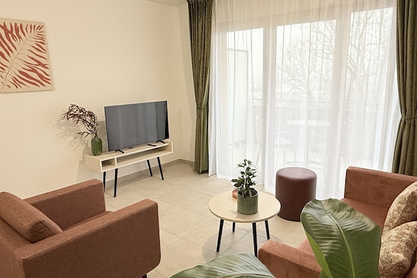Apartamento superior, suíte | Lounge