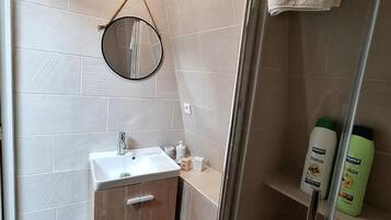 Hair dryer, towels, soap, toilet paper