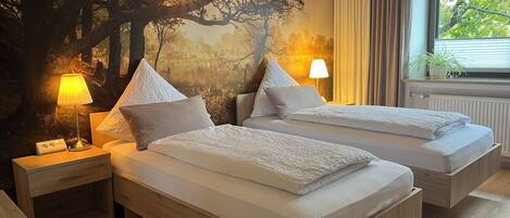 2 habitaciones, tabla de planchar con plancha, wifi y ropa de cama