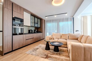 A modern kitchen with built-in appliances and a large window. - Villa Ballat With Heated Pool (Privlaka)