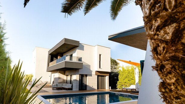 A modern house with a pool, a balcony, and a patio area with lounge chairs. - Villa Positiva With Heated Pool (Vir)
