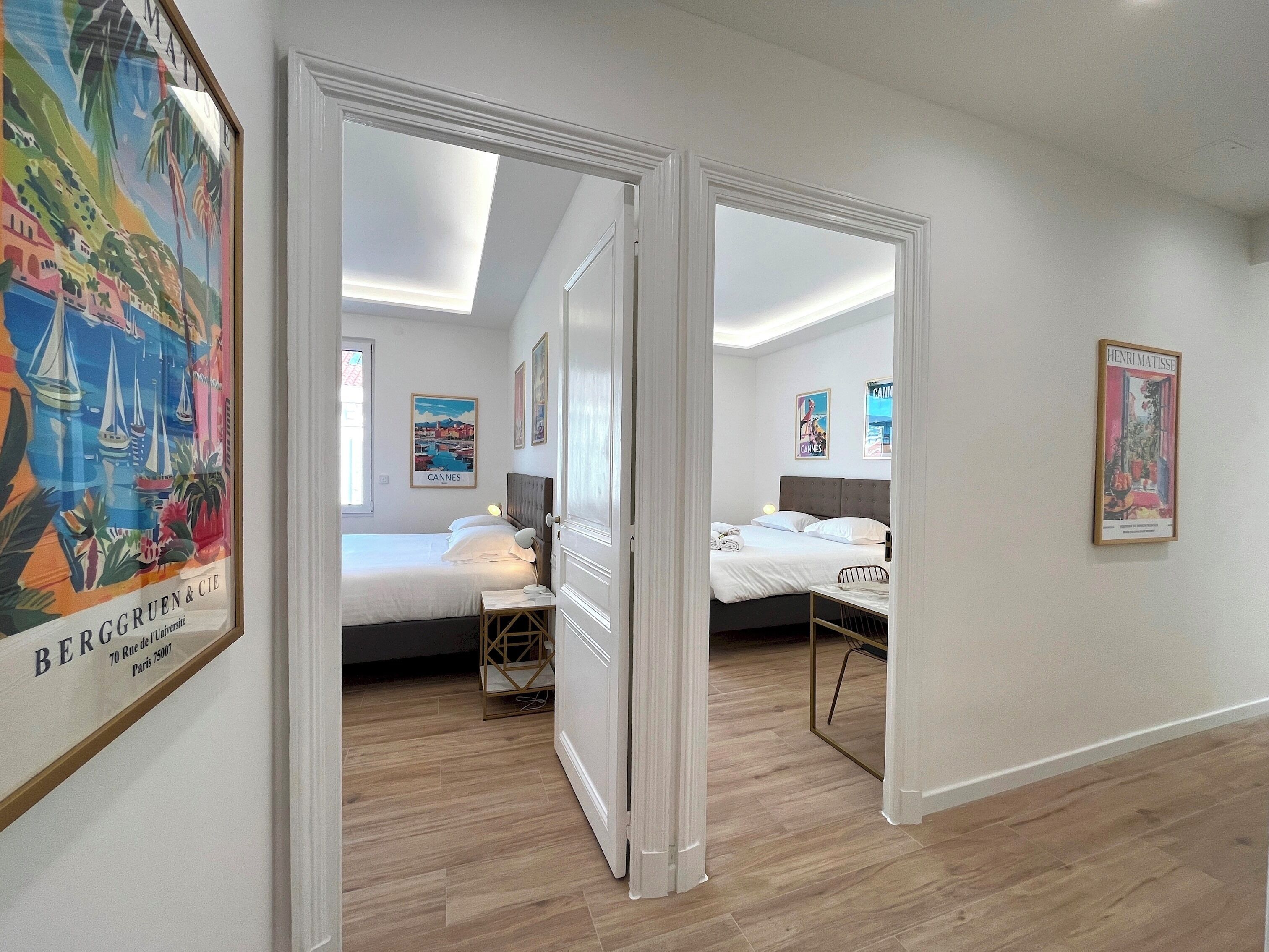 Desk, iron/ironing board, bed sheets