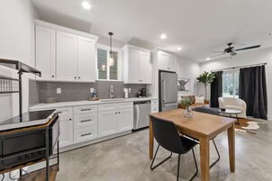 Luxury Townhome, Kitchenette, Ground Floor | Private kitchen | Coffee/tea maker, toaster, paper towels