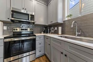 Luxury Townhome, Pets Not Allowed | Private kitchen | Coffee/tea maker, toaster, paper towels