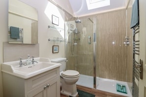 Shower, eco-friendly toiletries, hair dryer, towels