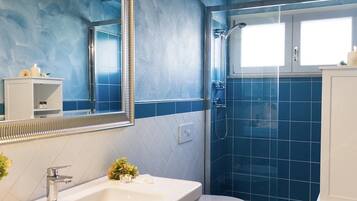 Family Suite, Terrace, Garden View | Bathroom | Shower, hair dryer, towels, toilet paper