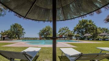 Seasonal outdoor pool, pool umbrellas, pool loungers