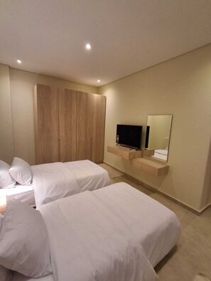 Standard Apartment, 2 Bedrooms | In-room safe, blackout drapes, soundproofing, iron/ironing board - Mozaik Condotel (Giza)