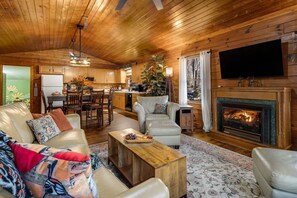 TV, fireplace - Sasquatch Hideout, 3-bedroom cabin in Maggie Valley, NC (Maggie Valley)