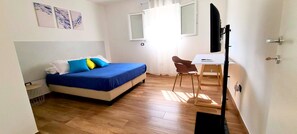 2 dormitorios, tabla de planchar con plancha, wifi y ropa de cama