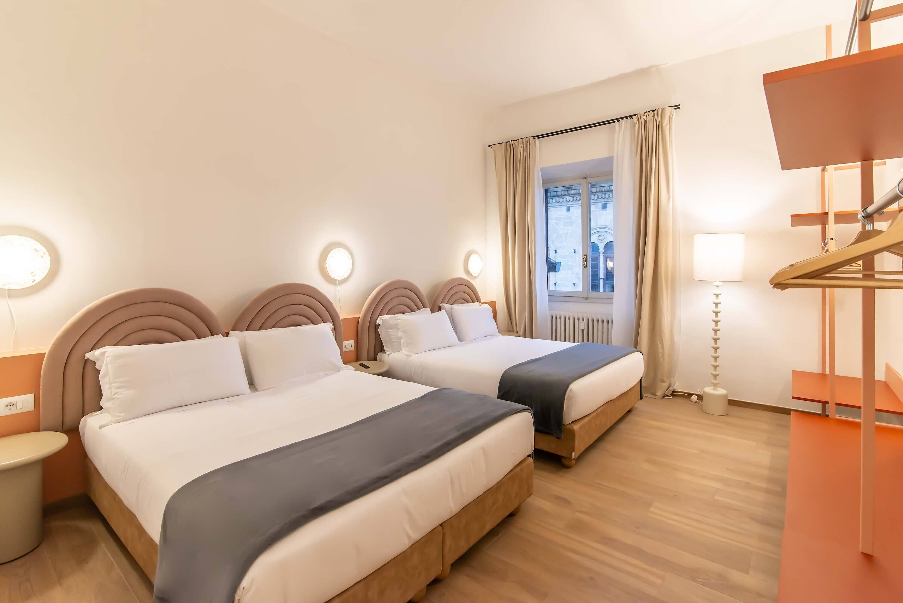 Premium bedding, blackout drapes, soundproofing, iron/ironing board