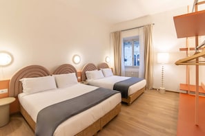 Premium bedding, blackout drapes, soundproofing, iron/ironing board