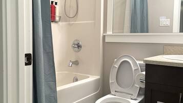 Hair dryer, towels, soap, shampoo
