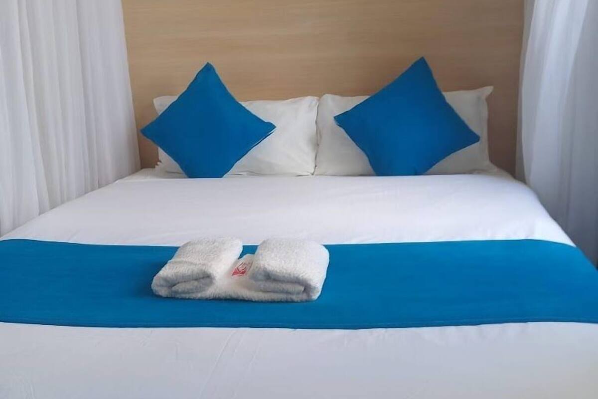 Habitación individual Deluxe | Wifi gratis y ropa de cama