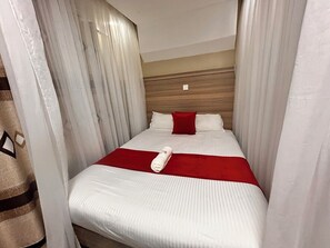 Habitación individual Deluxe | Wifi gratis y ropa de cama 