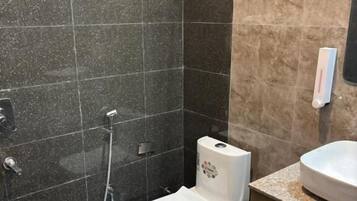 Deluxe Double Room, Balcony, Garden View | Bathroom | Bathrobes, slippers