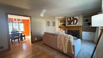 Smart TV, fireplace, books