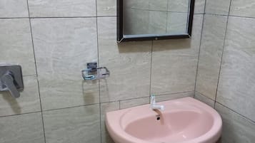 Deluxe Single Room | Bathroom | Shower, slippers, towels, soap