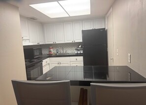 Private kitchen - 2 bedroom pool condo both with king beds.  Across the street from the beach!! (Cape Canaveral)