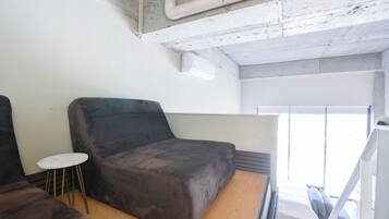 Club Studio, City View | Living area | 48-inch Smart TV with digital channels, streaming services