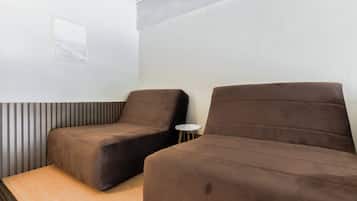 Club Studio, City View | Living area | 48-inch Smart TV with digital channels, streaming services