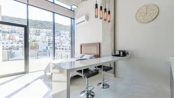 Studio Suite, City View | Iron/ironing board, free WiFi, bed sheets