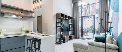 Premier Suite, City View | Living area | 48-inch Smart TV with digital channels, streaming services