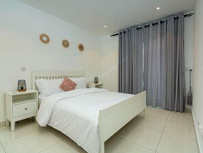In-room safe, desk, laptop workspace, iron/ironing board - Peravi Suites at The Lennox (Accra)