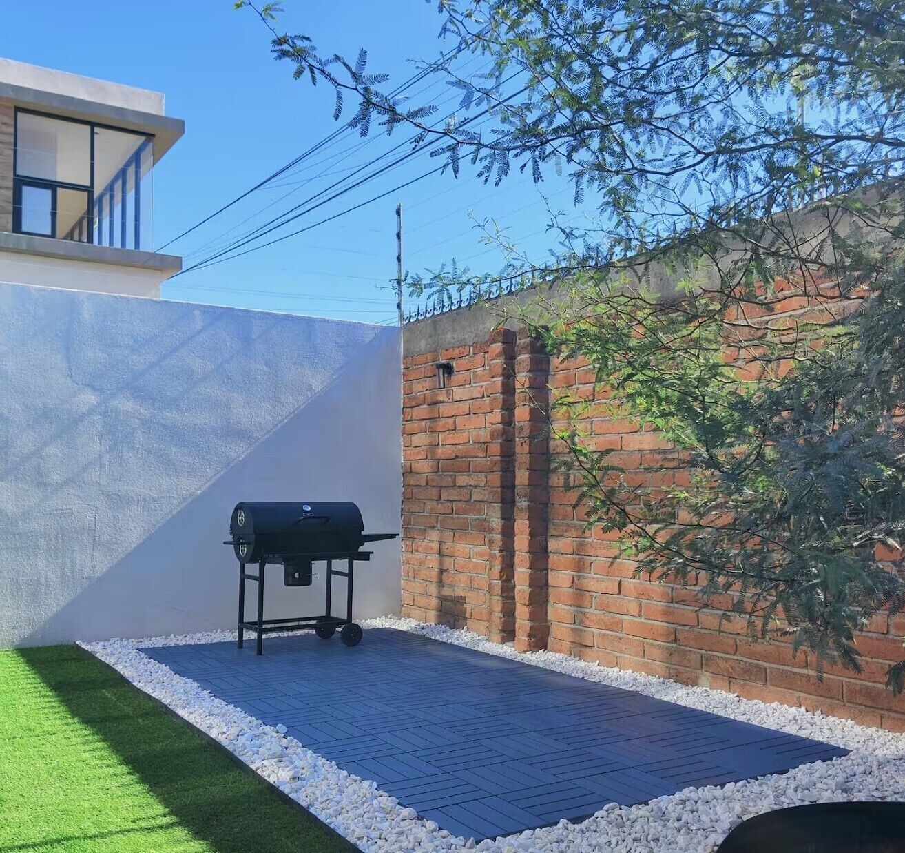 Appartement Confort, vue jardin | Enceinte de l’hébergement