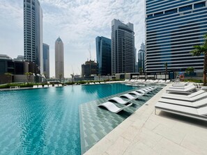 Outdoor pool - Curated High Floor1BR+Sofa Bed Water View Peninsula1 (Dubai)